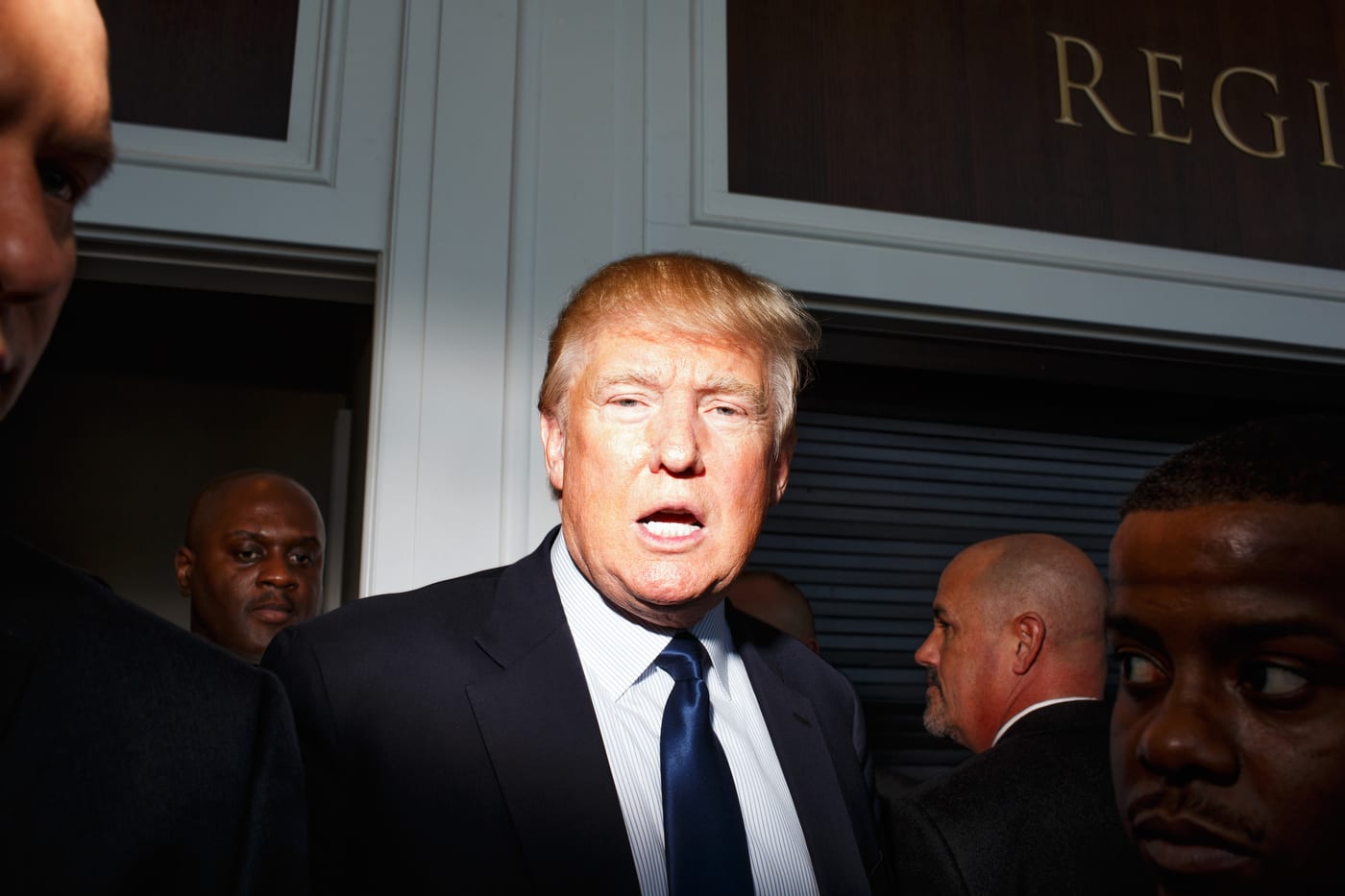 Donald Trump, surrounded by security, makes his way to a series of media interviews at CPAC in National Harbor, MD on Friday, February 27, 2015.