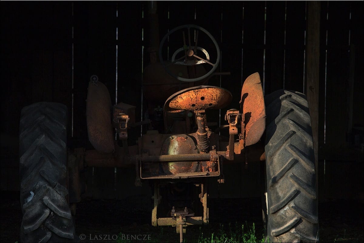 She heard the brake on the large tractor slip and, looking up, she saw it move forward, calculating its own path. Later she remembered that she had seen the Negro jump silently out of the way as if a spring in the earth had released him and that she had seen Mr. Shortley turn his head with incredible slowness and stare silently over his shoulder and that she had started to shout to the Displaced Person but that she had not. She had felt her eyes and Mr. Shortley’s eyes and the Negro’s eyes come together in one look that froze them in collusion forever, and she had heard the little noise the Pole made when the tractor wheel broke his backbone. — The Displaced Person